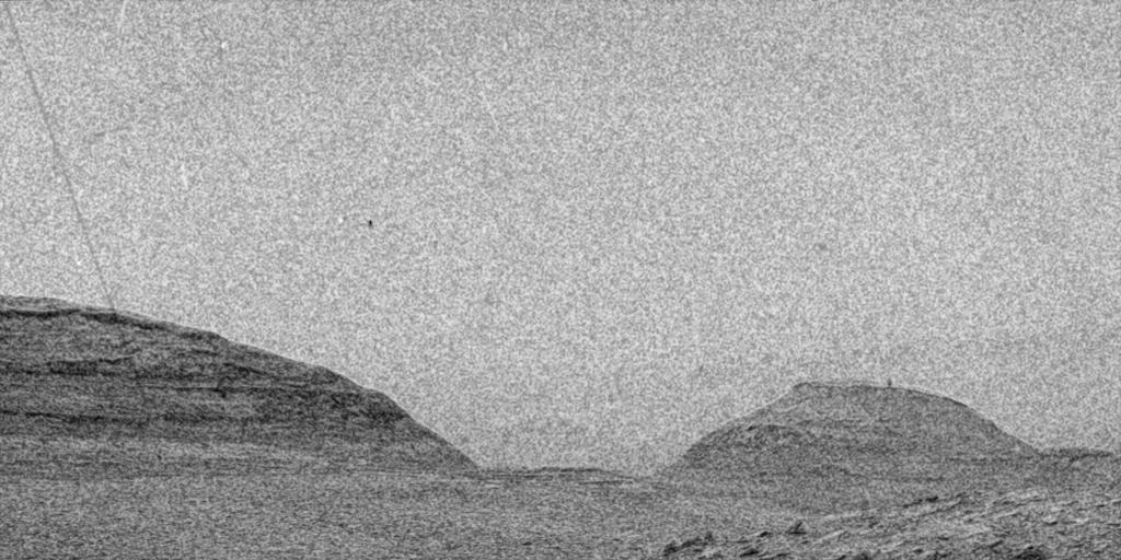 NASA’s Curiosity Mars rover captured black-and-white streaks on Mars