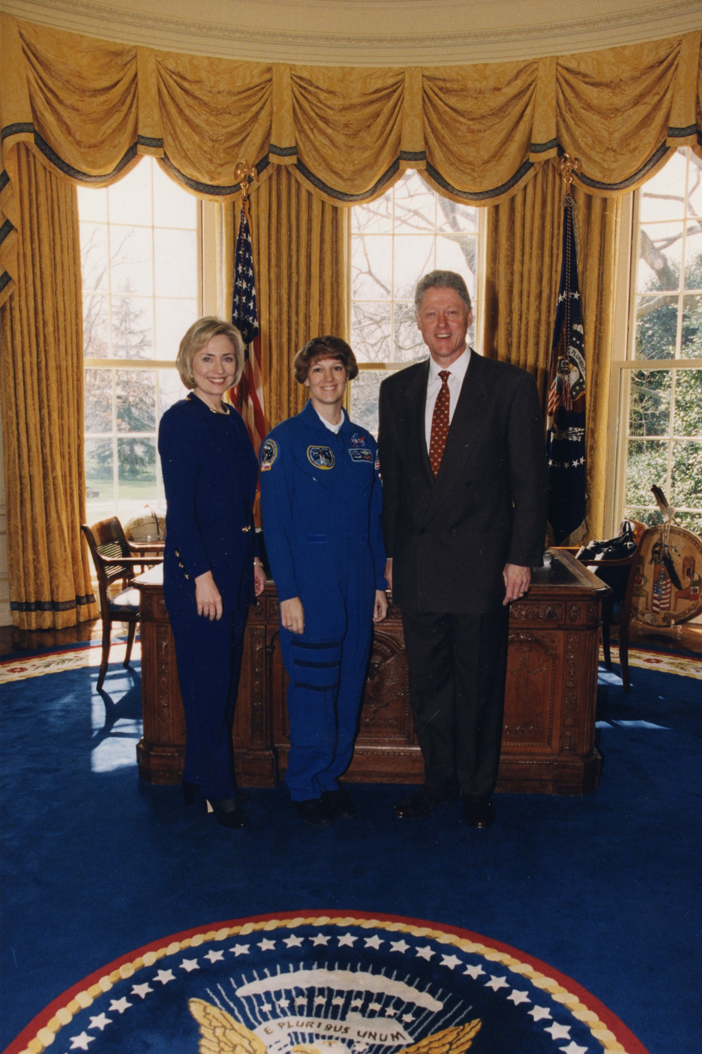 Hillary Clinton, Eileen Collins, and President Bill Clinton in the Oval Office