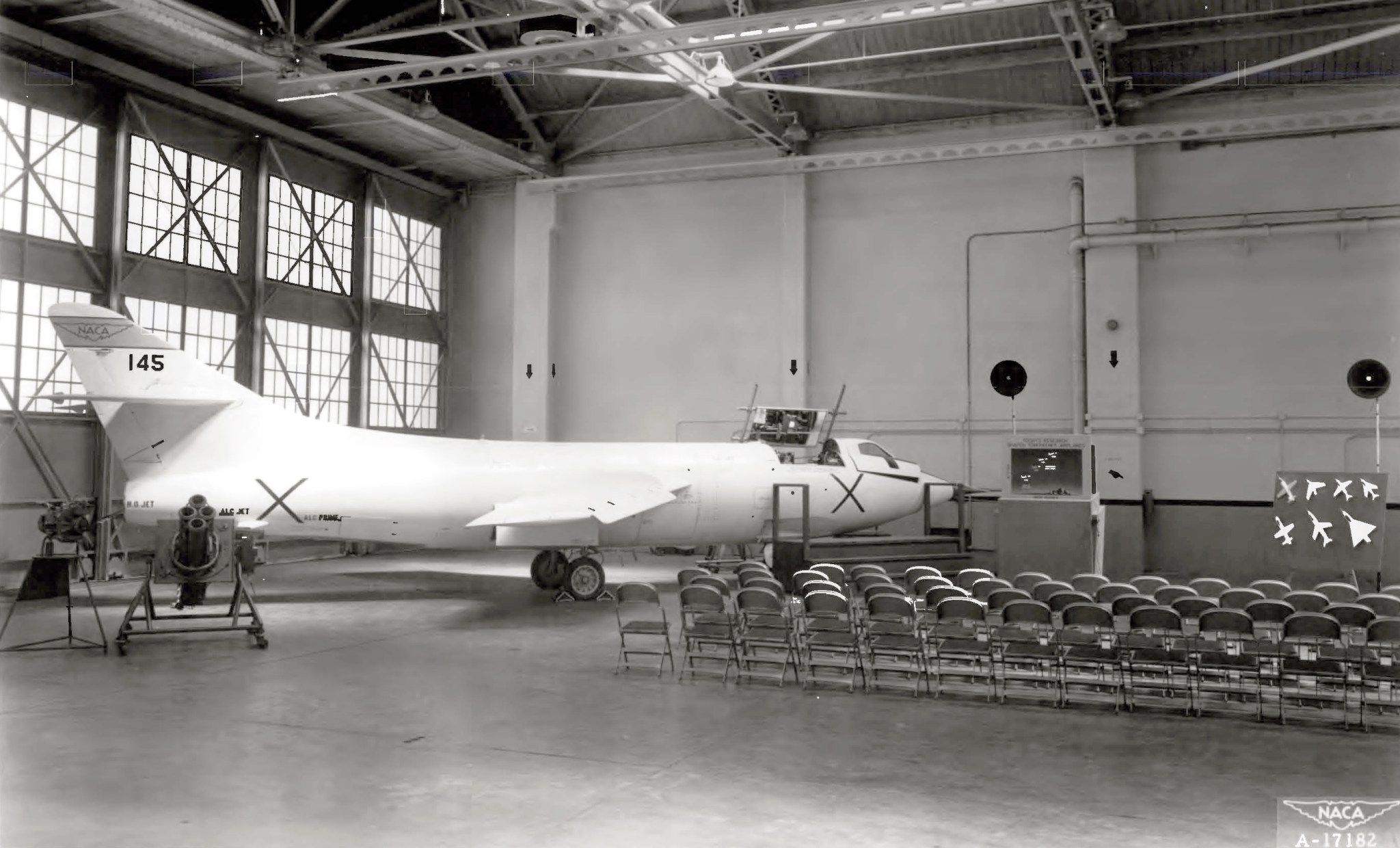 Aircraft in hangar.