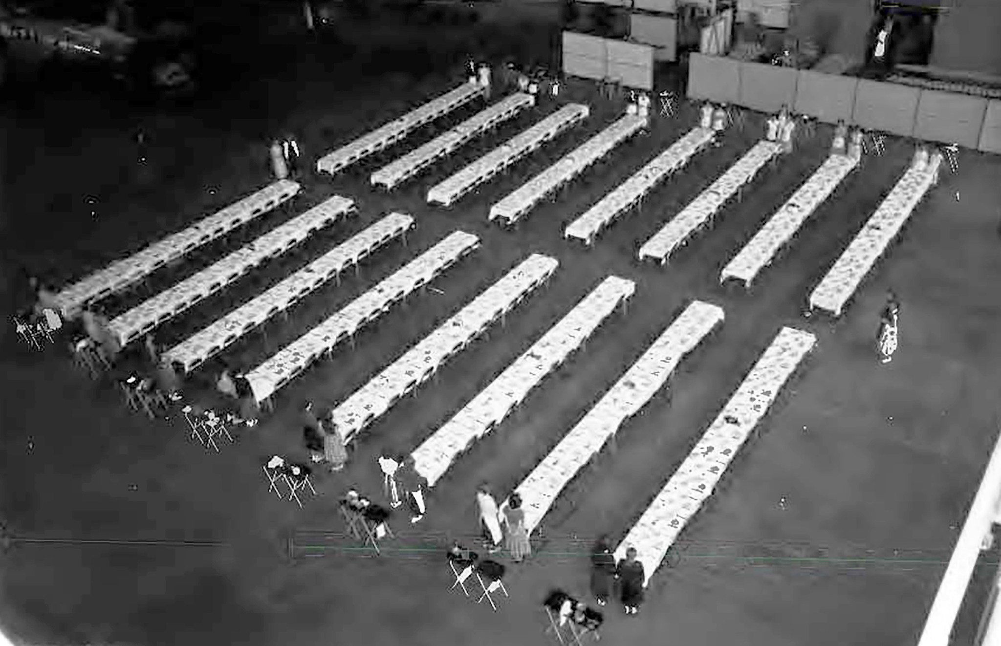 Overhead view of dining tables in hangar.