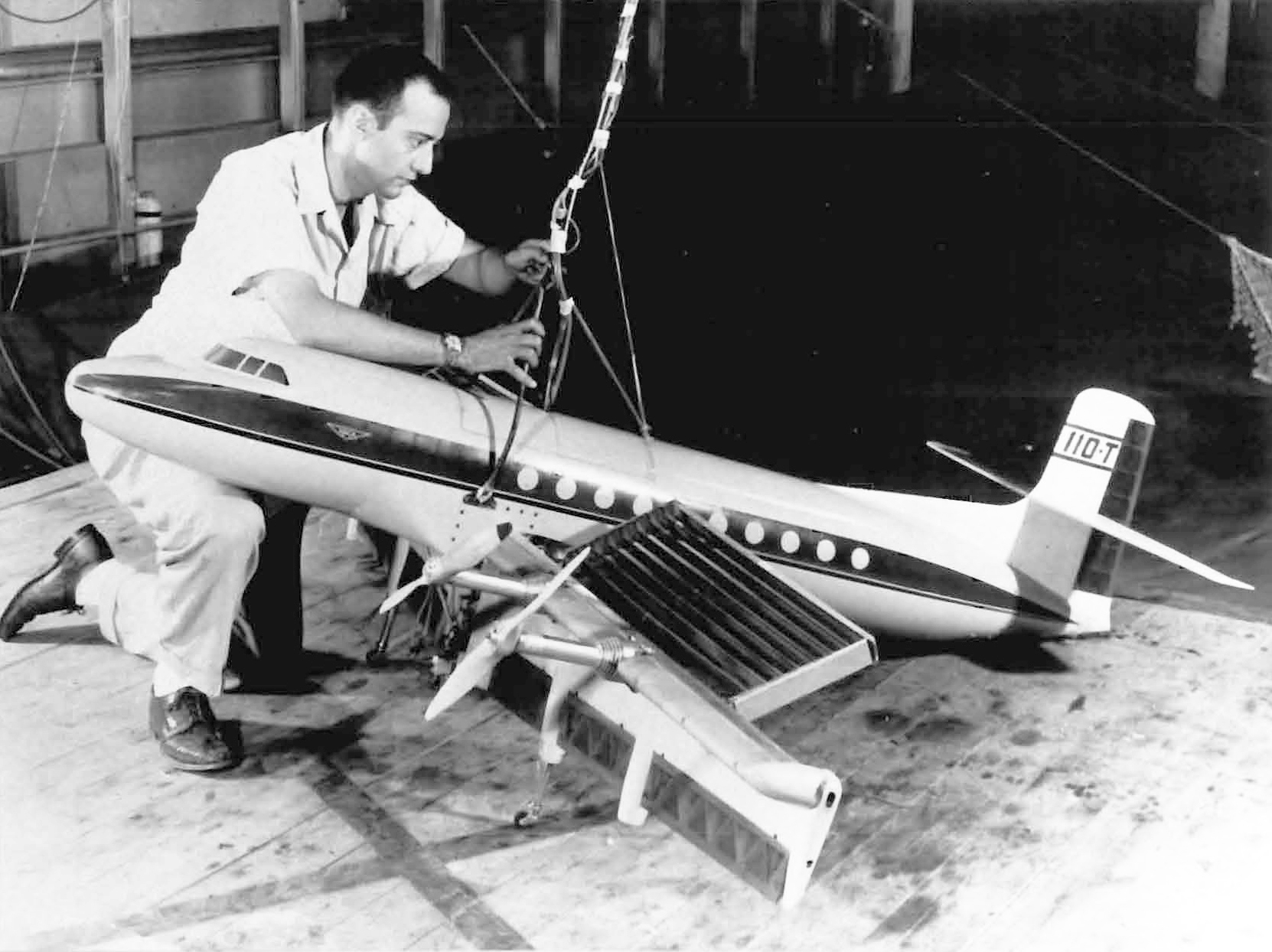 Man with airliner model.