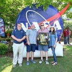 NASA Marshall Space Flight Center Director Joseph Pelfrey, second from left, presented Huntsville Mayor Tommy Battle, third from left, with an Artemis I Certificate of Appreciation during NASA in the Park on June 22 at Huntsville’s Big Spring Park East. They are joined by Larry Leopard, Marshall associate director, technical, far left, and Rae Ann Meyer, Marshall deputy director.