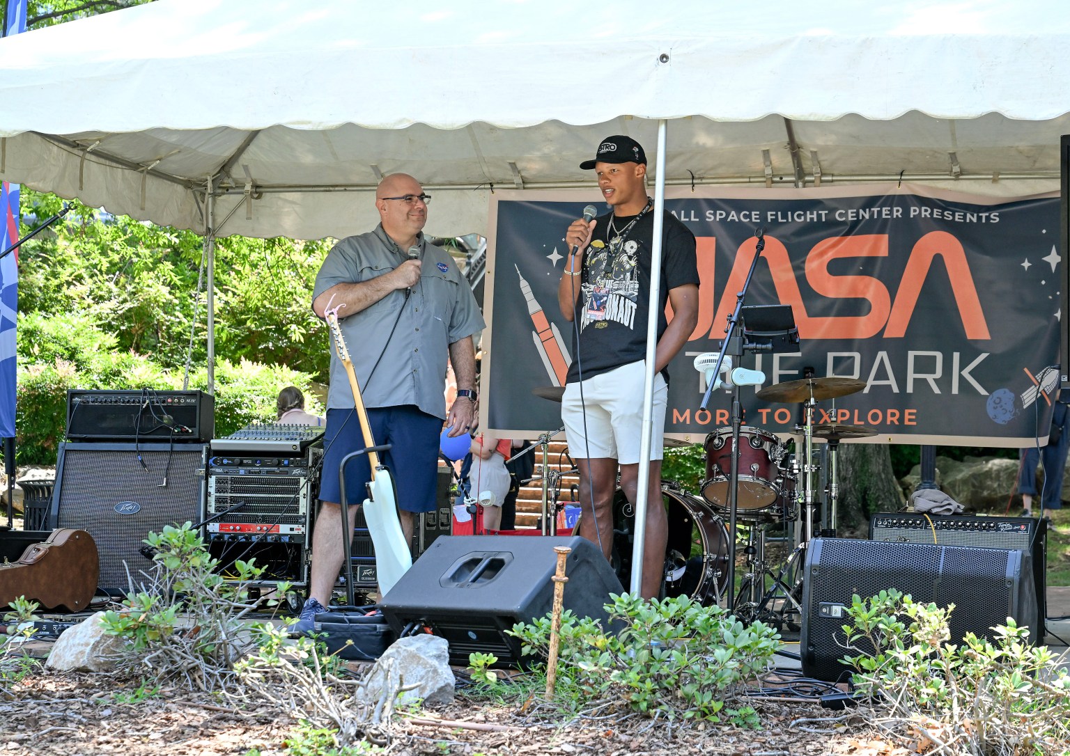 Marshall Director Joseph Pelfrey, left, interviews NFL quarterback Joshua Dobbs at NASA in the Park. In addition to his football career, Dobbs has an aerospace engineering degree and is engaged in STEM outreach through his foundation, ASTROrdinary.