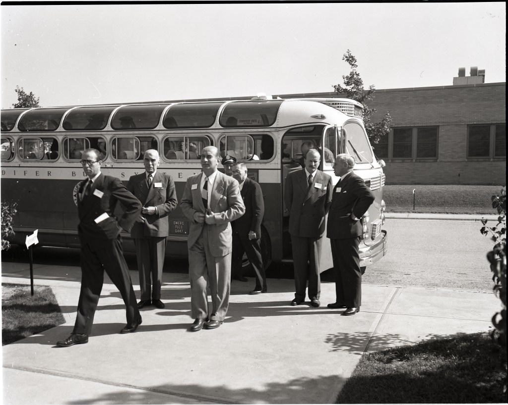Men exiting bus.
