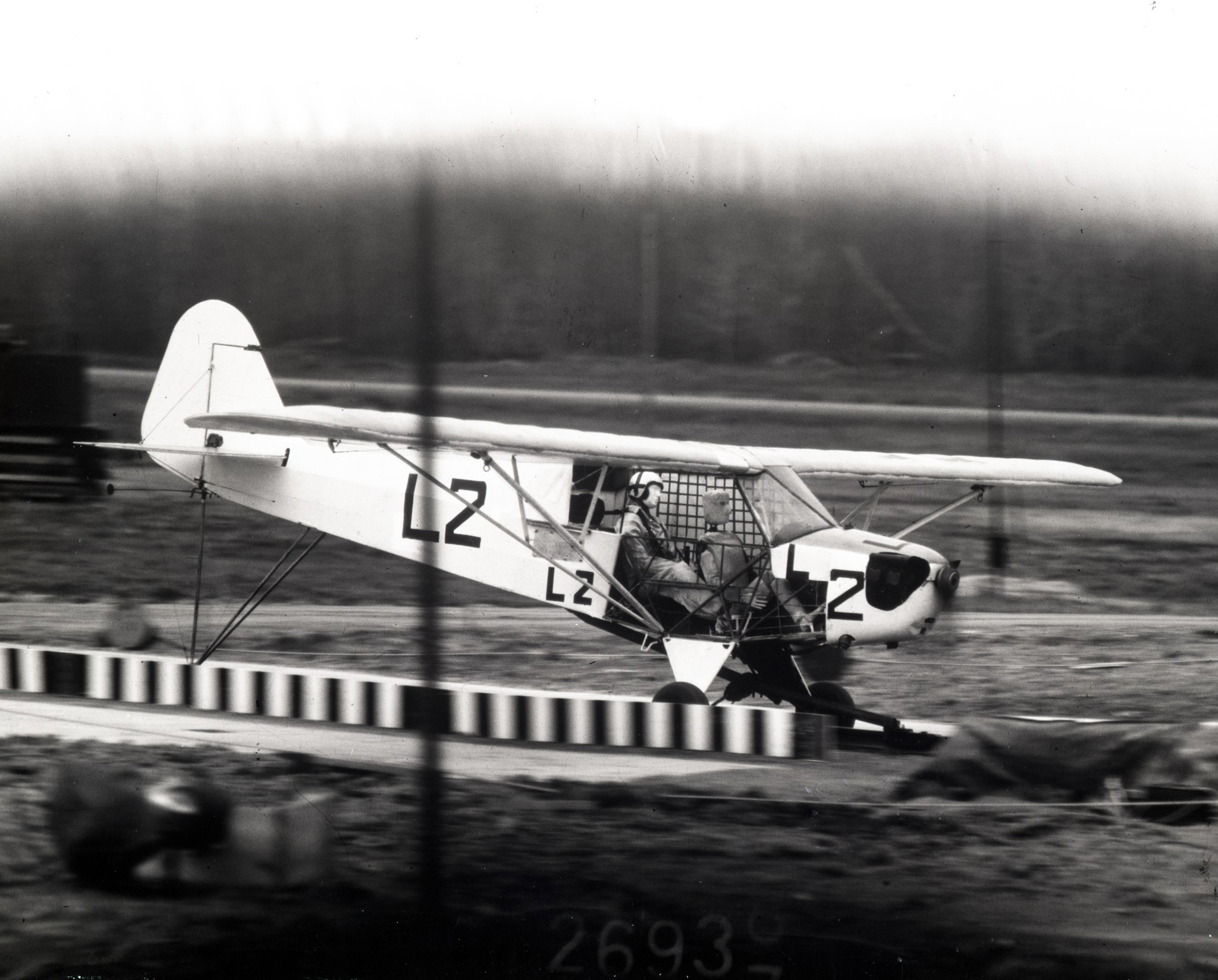 Small aircraft on runway.