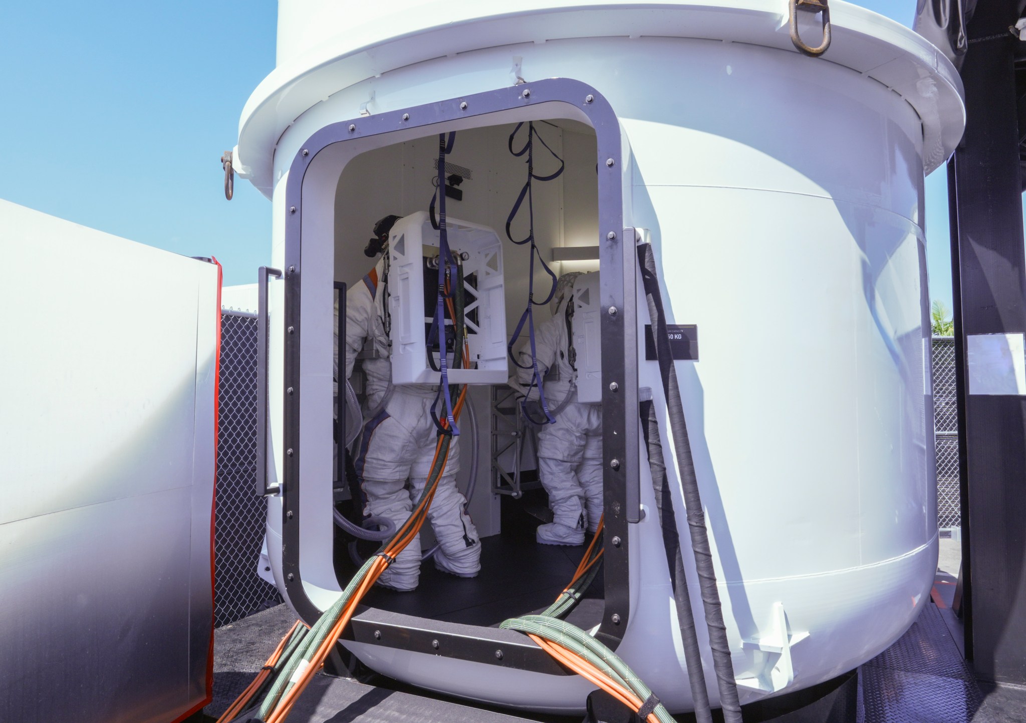 Astronauts were fully suited while conducting mission-like maneuvers in the full-scale build of the Starship human landing system’s airlock which will be located inside Starship under the crew cabin.