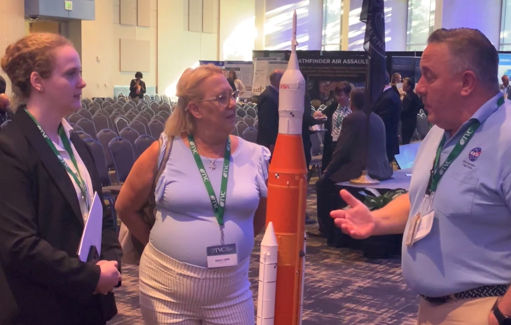 Trey Cate, right, SLS strategic communications manager at Marshall, talks with TVC National Summit attendees about the Space Launch System and NASA’s Artemis Program during a break between panel sessions at the May 29-30 event, hosted by Vanderbilt University in Nashville.