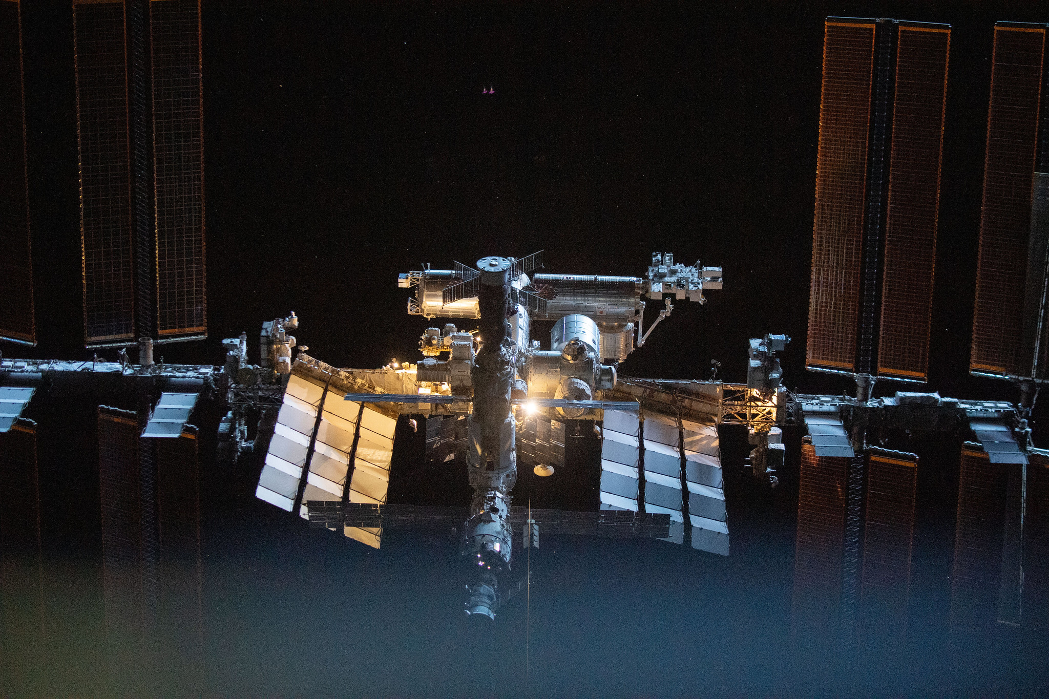 The International Space Station in orbit with deep space in the background