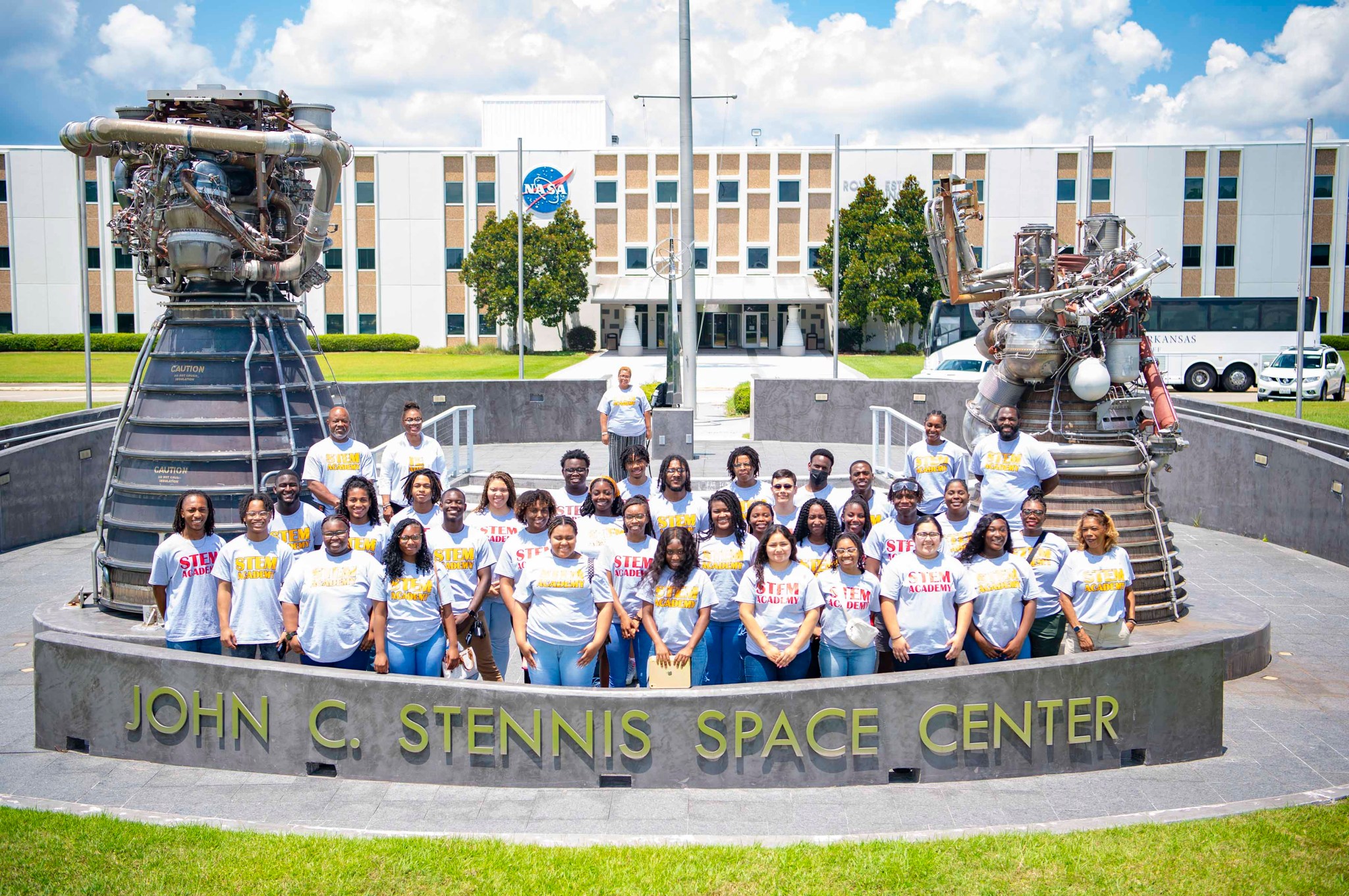 Participants in the University of Arkansas at Pine Bluff STEM (science, technology, engineering and mathematics) Summer Institute stand in front of the Roy Estess Building at NASA’s Stennis Space Center