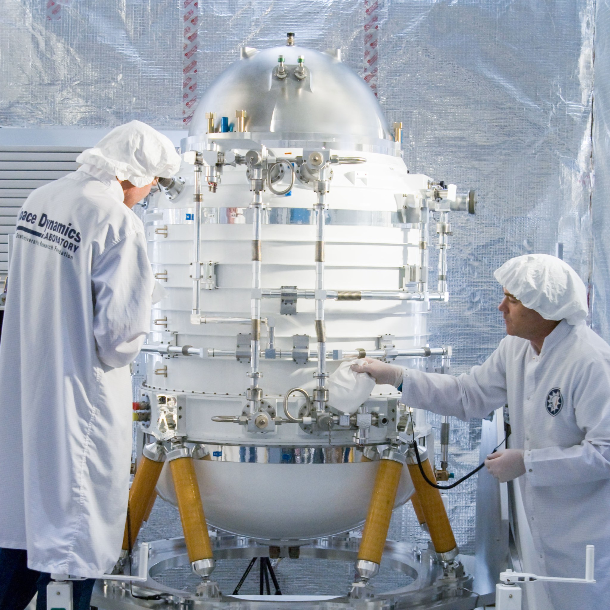 WISE mission’s telescope is worked on by engineers