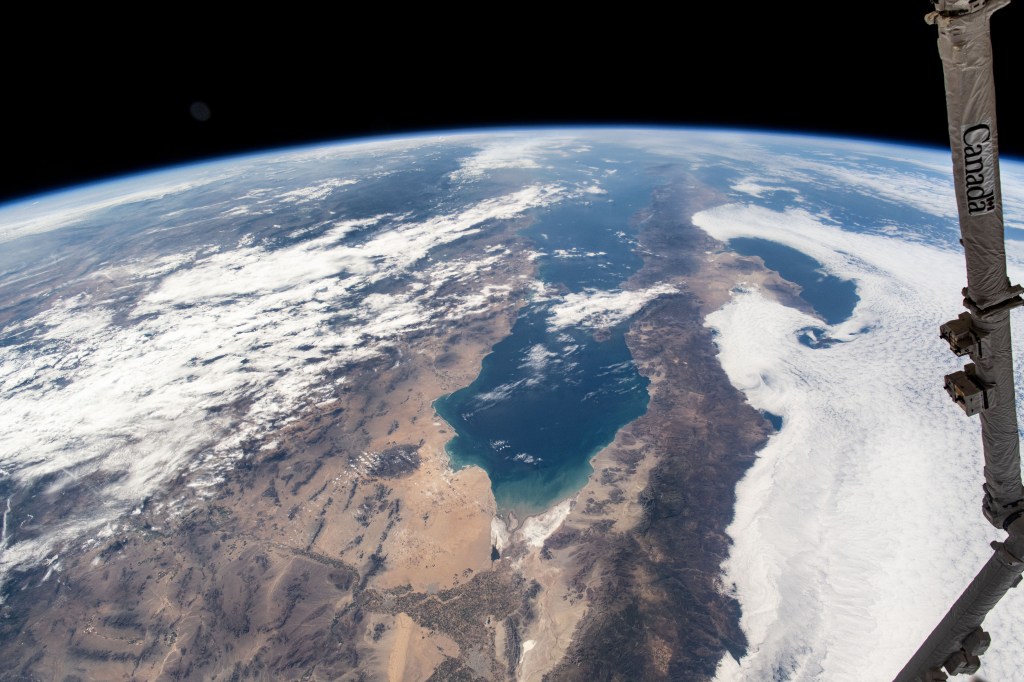 iss071e262729 (June 29, 2024) -- A sheet of clouds moves in over Baja California and the Gulf of California as the International Space Station soared 262 miles above.
