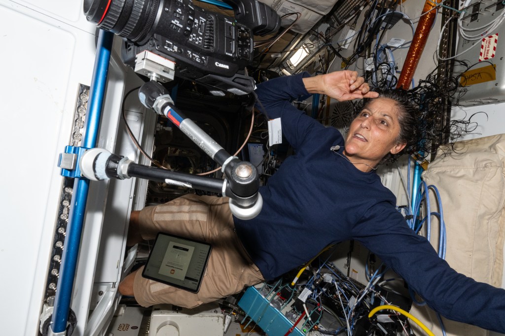 NASA astronaut and Boeing's Crew Flight Test Pilot Suni Williams is pictured after conducting an exercise session on the COLBERT treadmill located inside the International Space Station's Tranquility module.