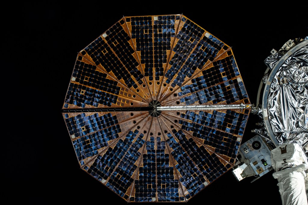 iss071e329922 (July 12, 2024) -- The cymbal-shaped solar array, deployed on Northrop Grumman's Cygnus space freighter, is pictured against the black of space ahead of the release of Cygnus from the International Space Station's Unity module on July 12, 2024.