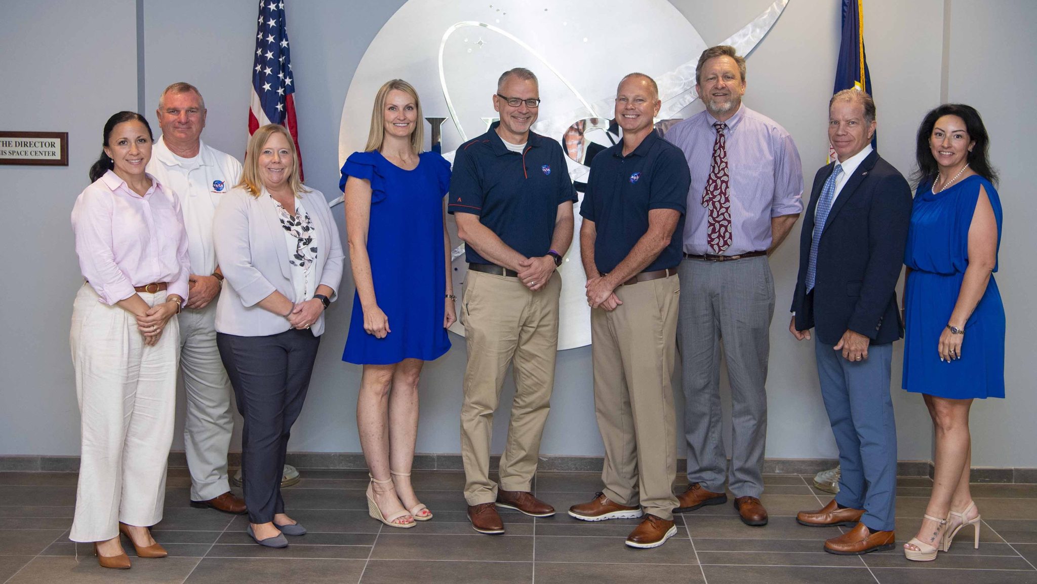 NASA Associate Administrator Jim Free stands with leaders from NASA Stennis and the NASA Shared Services Center