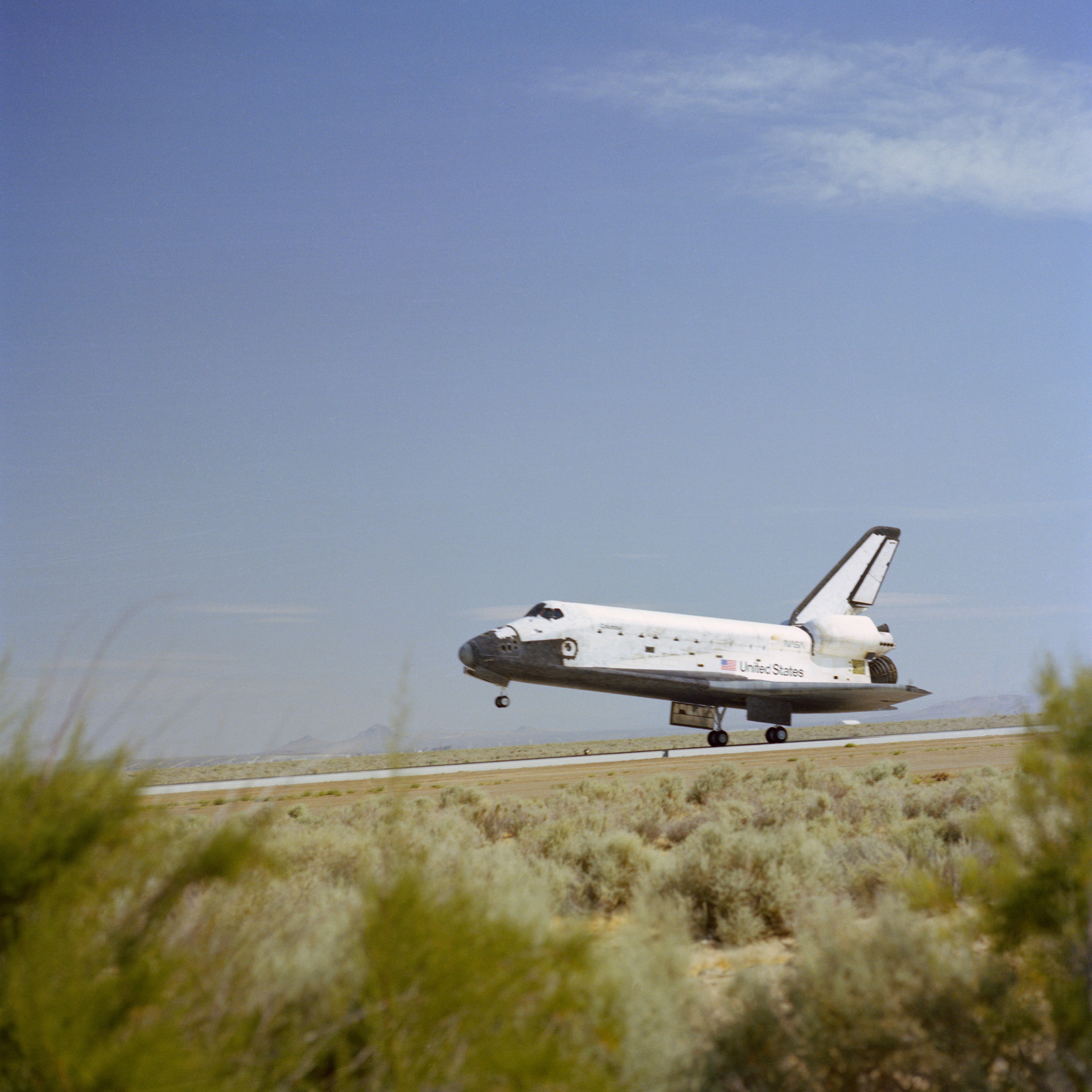 Space shuttle Columbia makes a touchdown at Edwards Air Force Base (AFB) in California to end the STS-4 mission