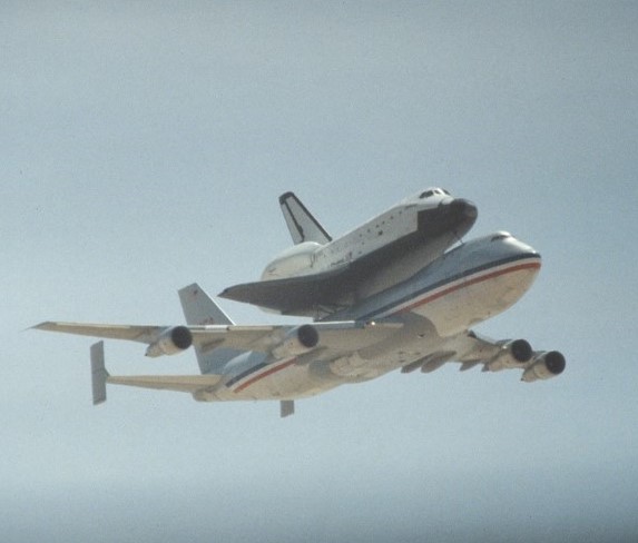 Space shuttle Challenger departs Edwards AFB atop its Shuttle Carrier Aircraft on its way to NASA’s Kennedy Space Center in Florida