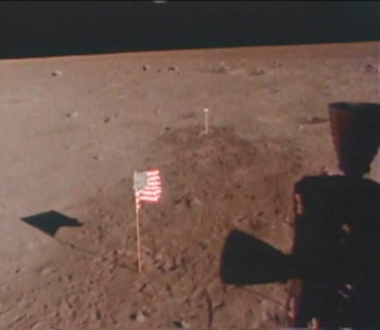 The same view, and the flag moved! Not aliens, it settled in the loose lunar regolith overnight