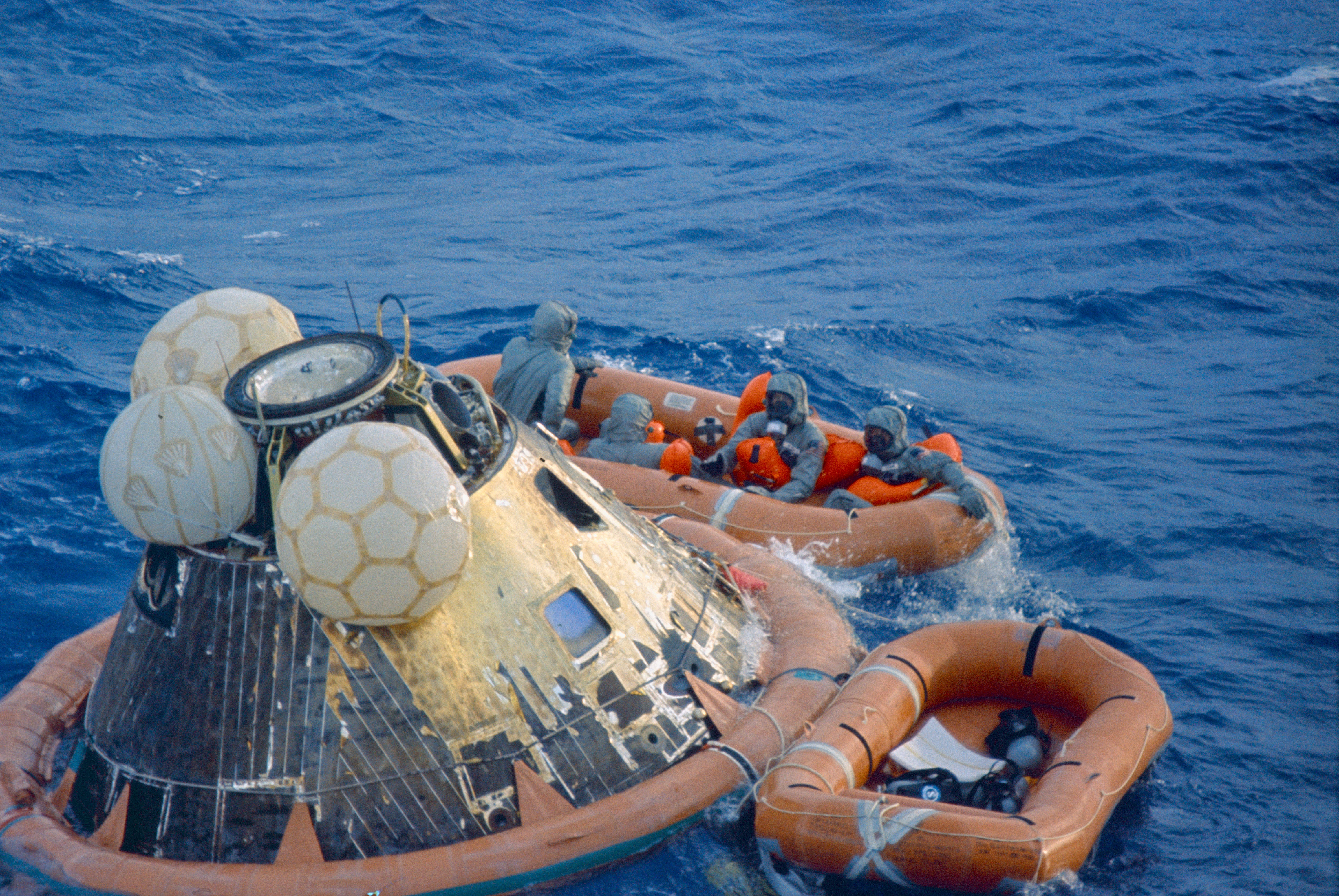 Hatleberg, left, with Neil, Buzz, and Mike in the decontamination raft