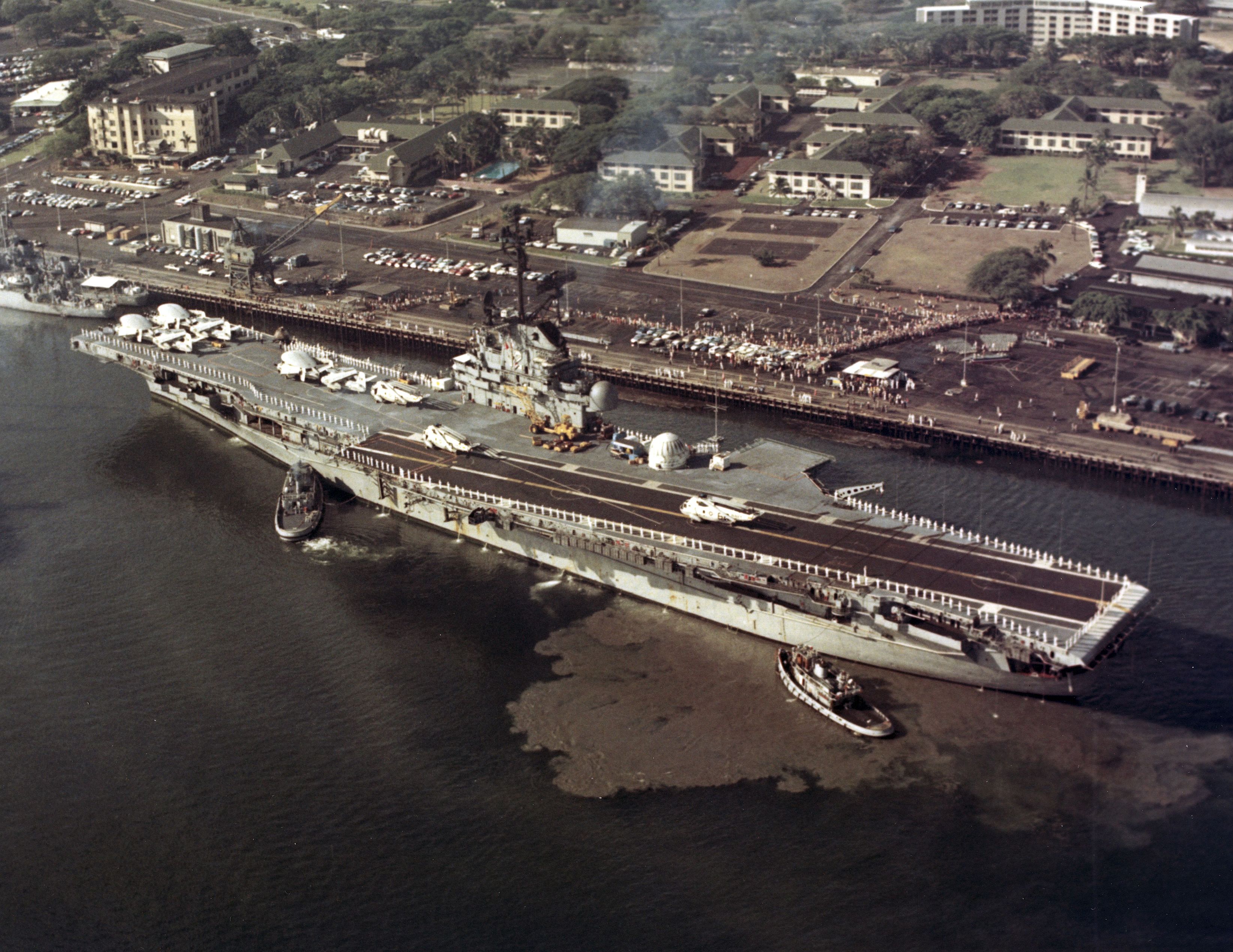 Two days after splashdown, the U.S.S. Hornet docks at Pearl Harbor in Honolulu