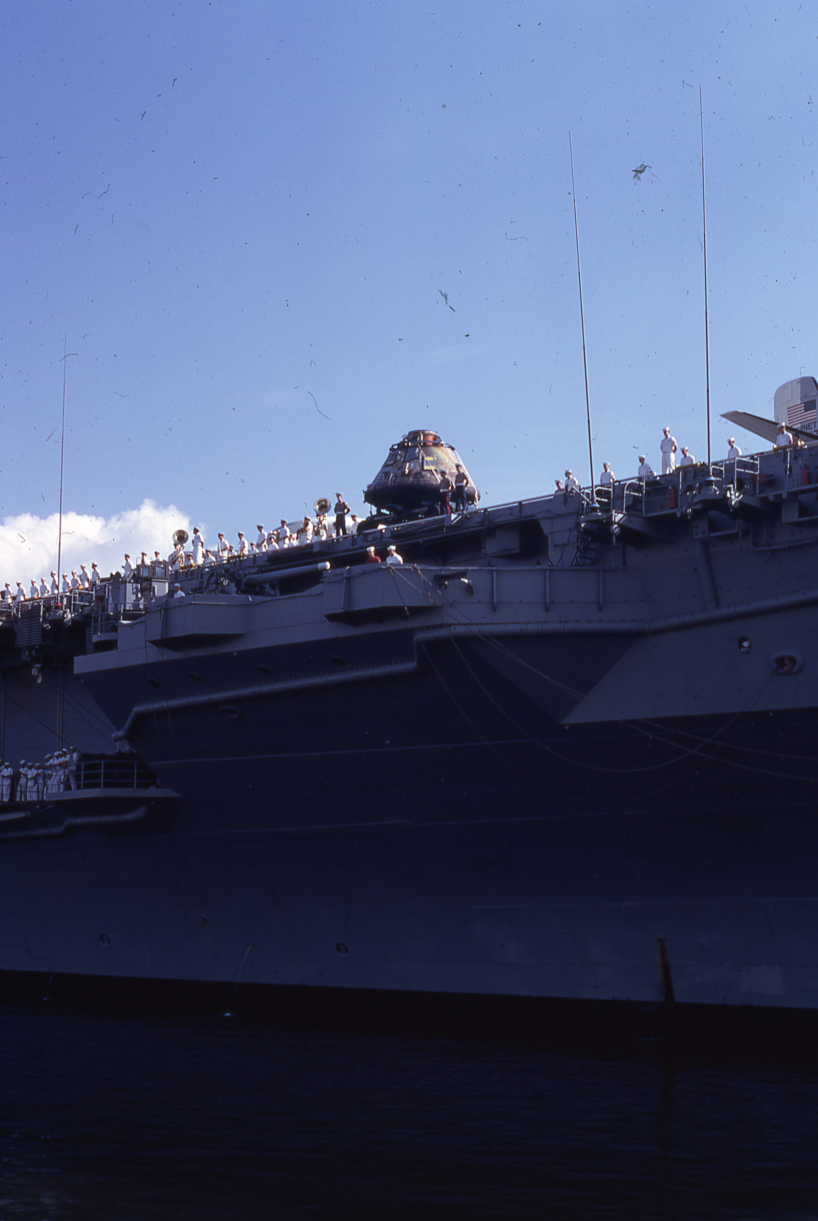 Columbia brought on deck as Hornet docks in Pearl Harbor