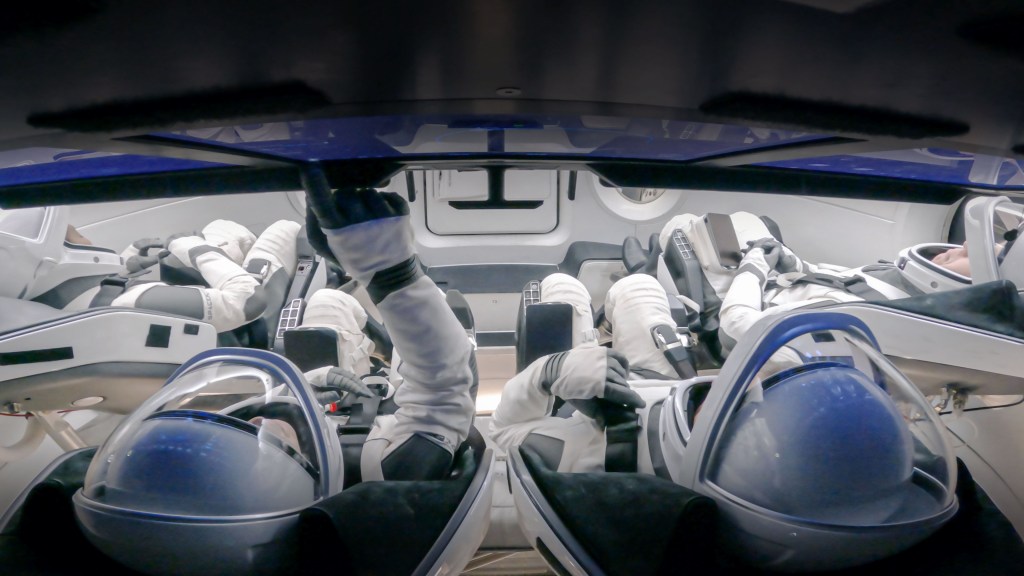 The crew of NASA's SpaceX Crew-9 mission train inside a simulator at SpaceX's headquarters in Hawthorne, California.