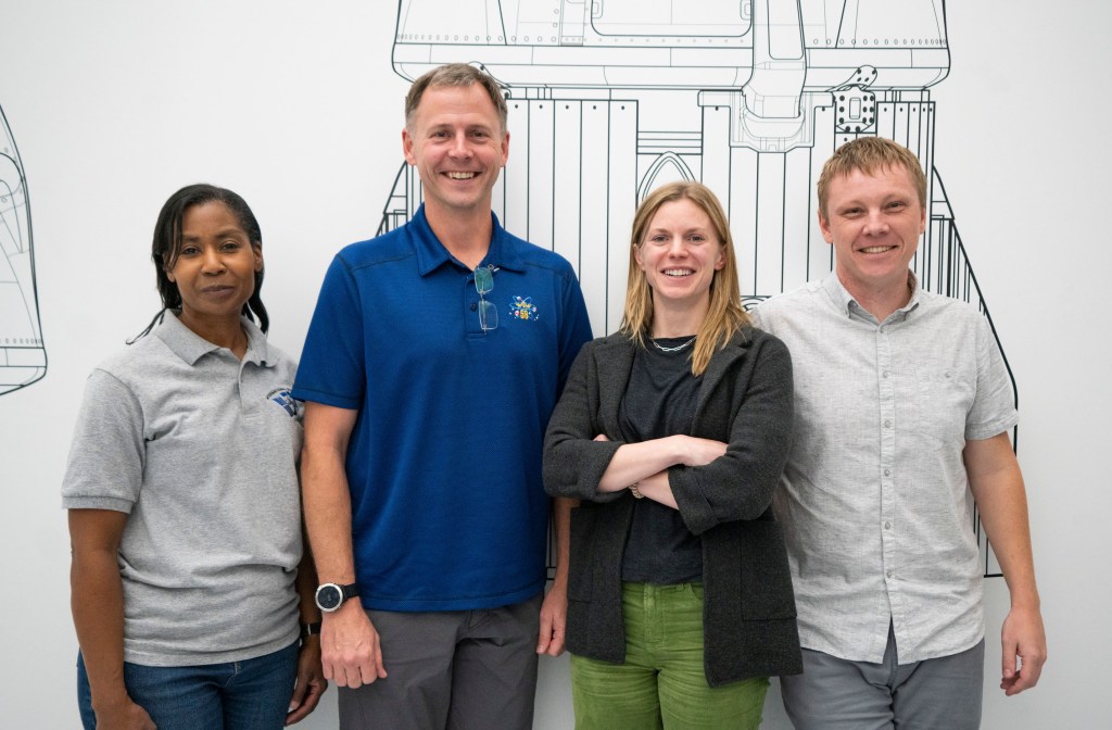 The SpaceX Crew-9 crew members pose for a photo at SpaceX's headquarters in Hawthorne, California.