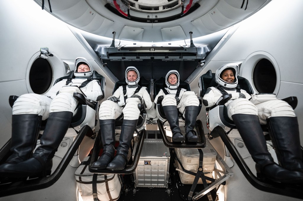 Members of NASA's SpaceX Crew-9 mission are seated inside SpaceX's Crew Dragon spacecraft.