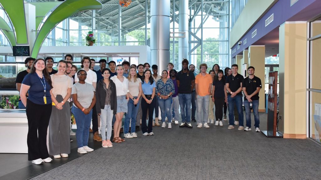 NASA Stennis federal city interns pose for a photo during their tour of INFINITY Science Center