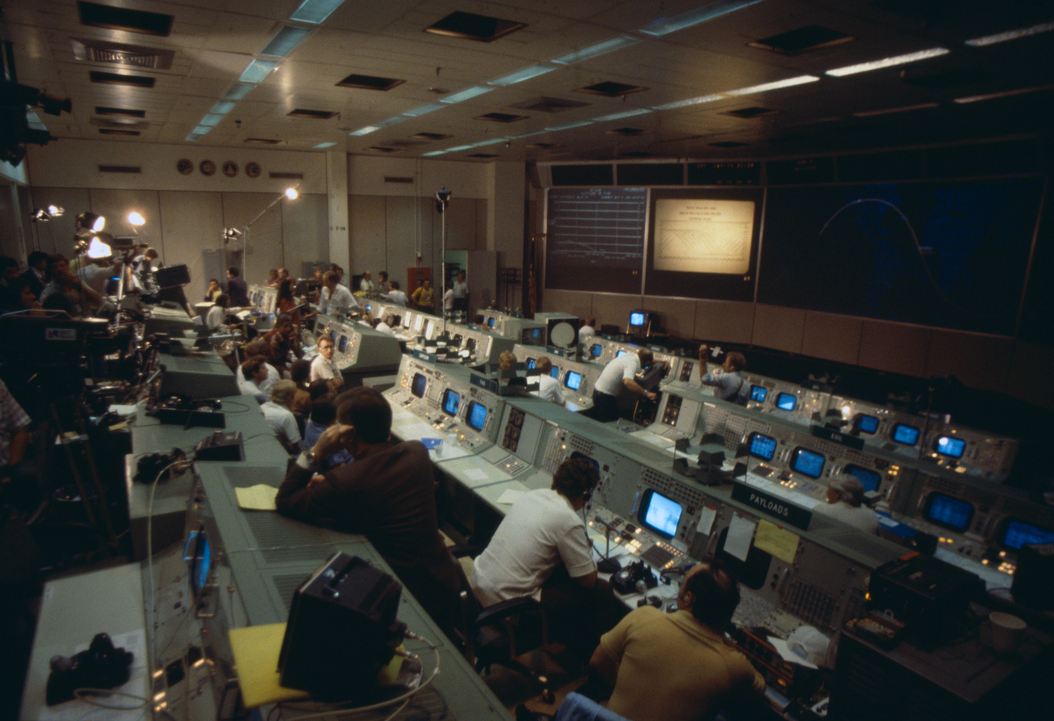 Operators in Mission Control at NASA’s Johnson Space Center in Houston during the Skylab reentry