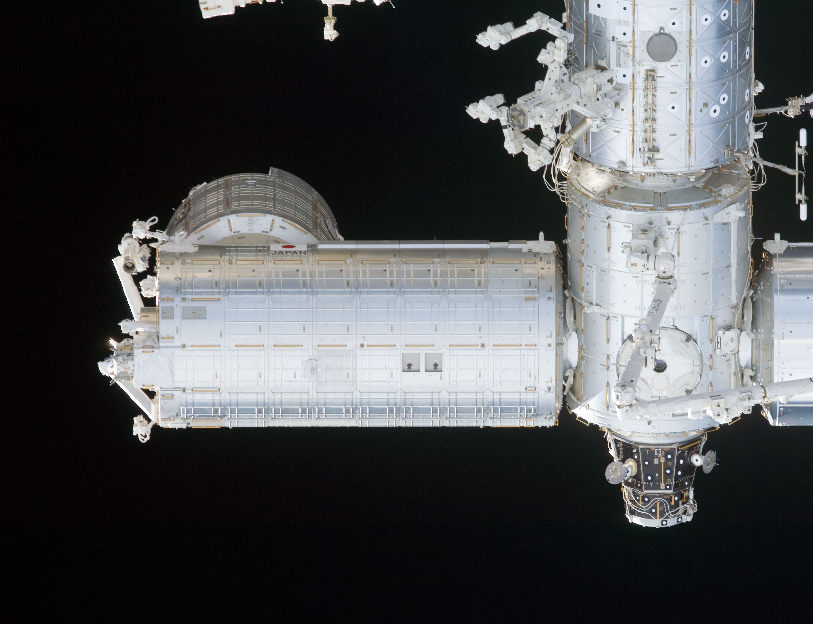 Close up of the Kibo Japanese Experiment Module – the astronauts attached the Exposed Facility at the left end of the module