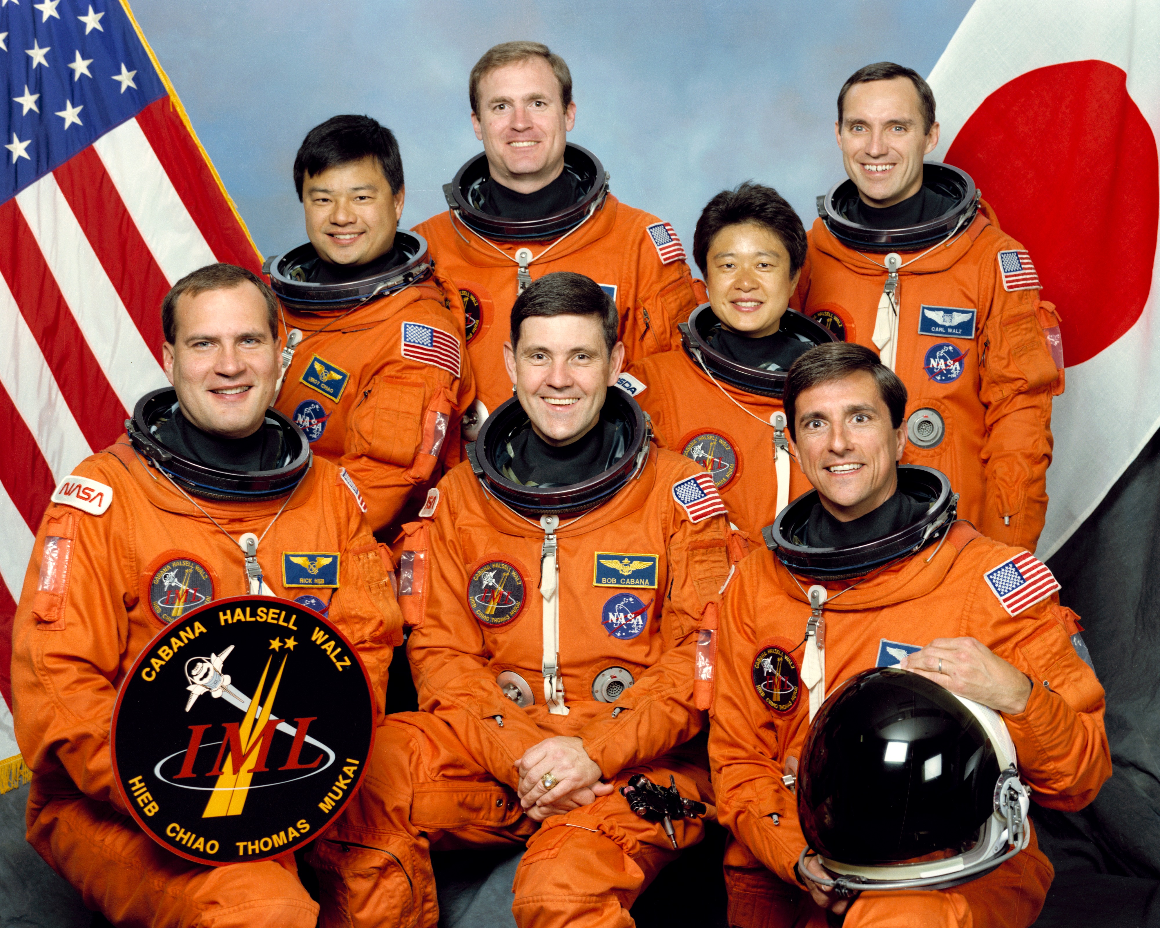 Official photo of the STS-65 crew of Richard J. Hieb, seated left, Robert D. Cabana, and Donald A. Thomas; Leroy Chiao, standing left, James D. Halsell, Chiaki Mukai of Japan, and Carl E. Walz