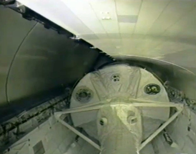 The astronauts close Columbia's payload bay doors prior to entry