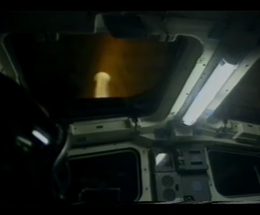 Flash of plasma seen through Columbia's overhead window during reentry