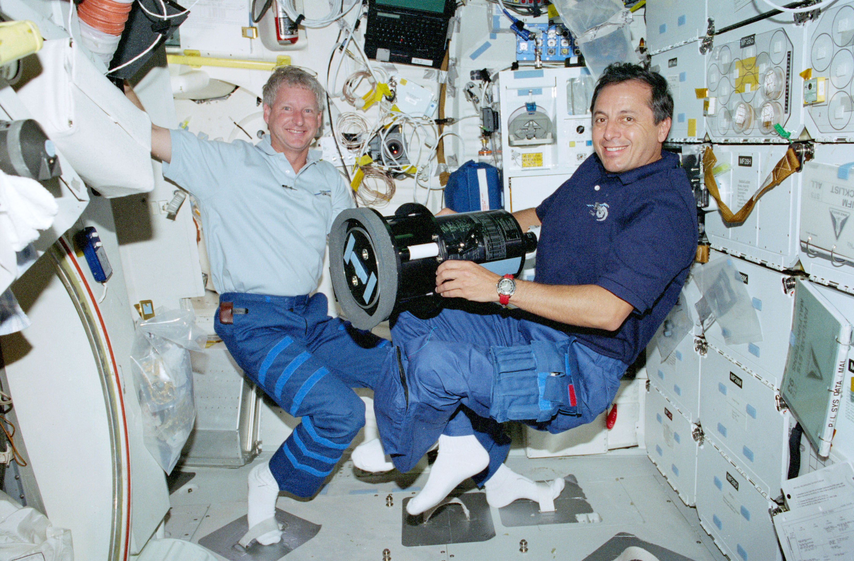 Stephen A. Hawley, left, and Michel A. Tognini operate the Southwest Ultraviolet Imaging System instrument