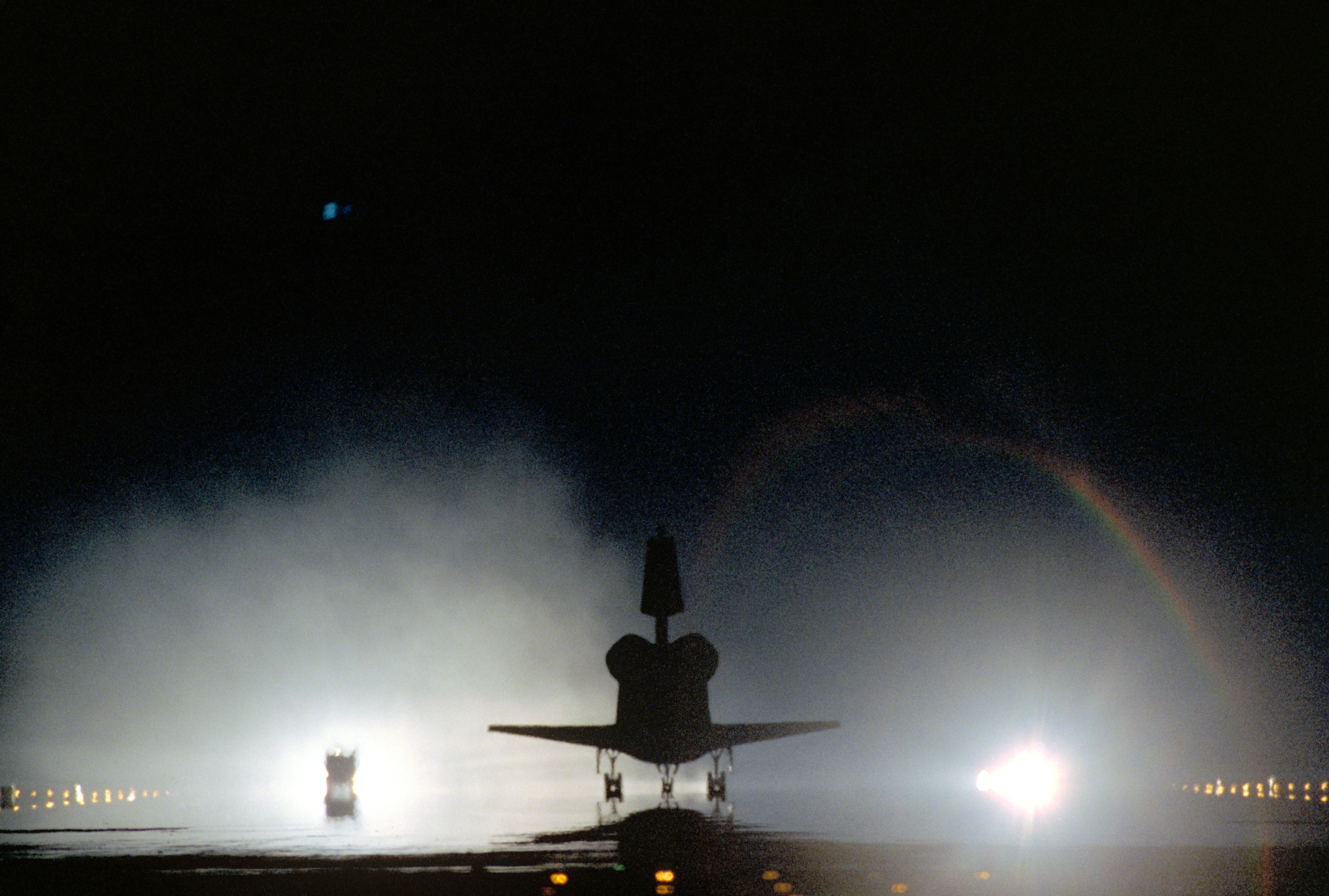 Collins guides Columbia to a smooth touchdown on the Shuttle Landing Facility at NASA's Kennedy Space Center in Florida