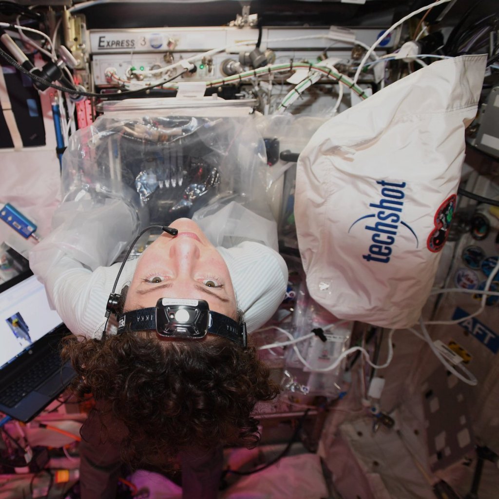 Astronaut in the ISS using Techshot's 3D printer