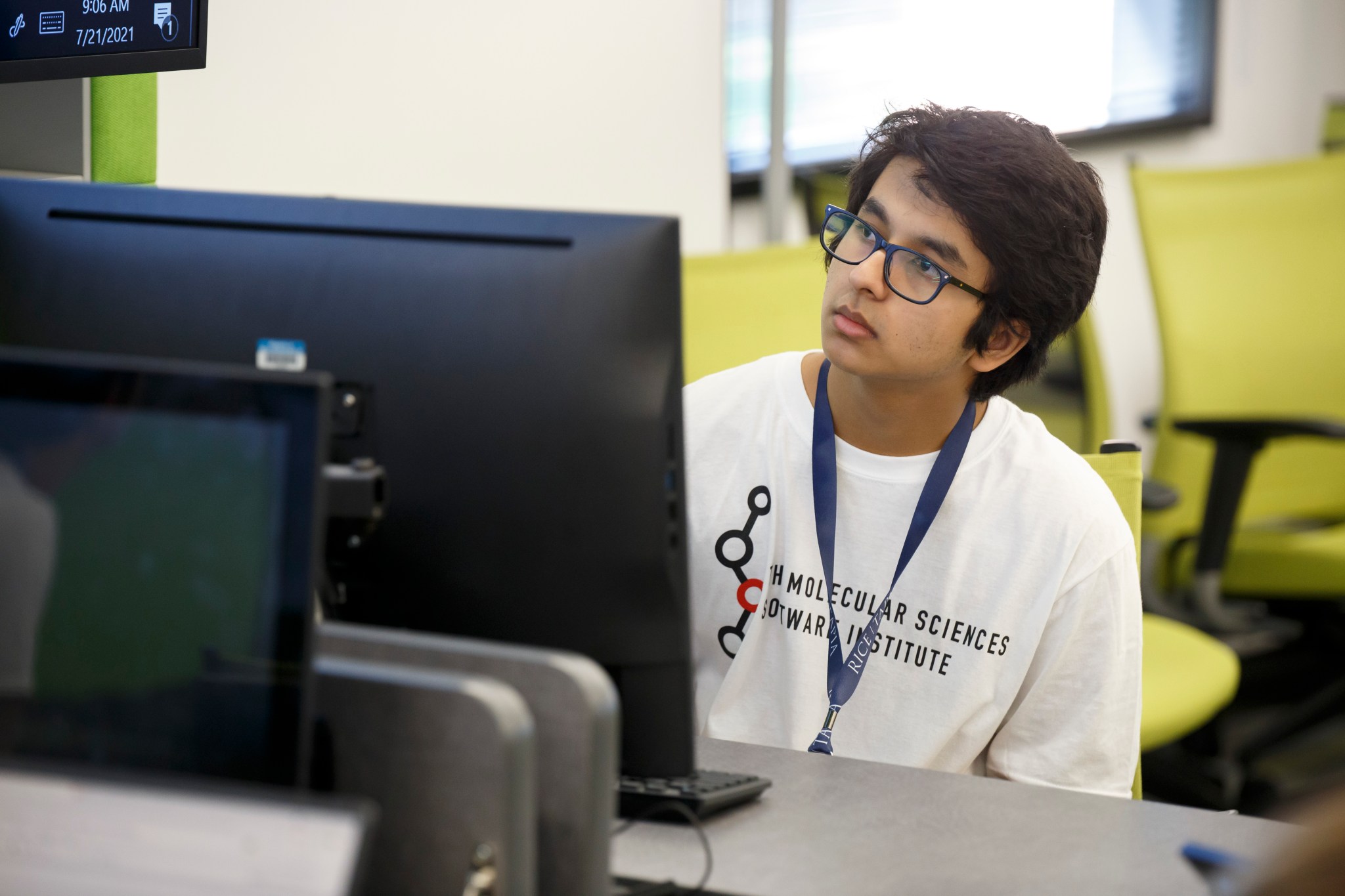 Rawal’s project contributed to the development of an interface that allows students to control robots over local and remote wireless connections. This is him at a computer.