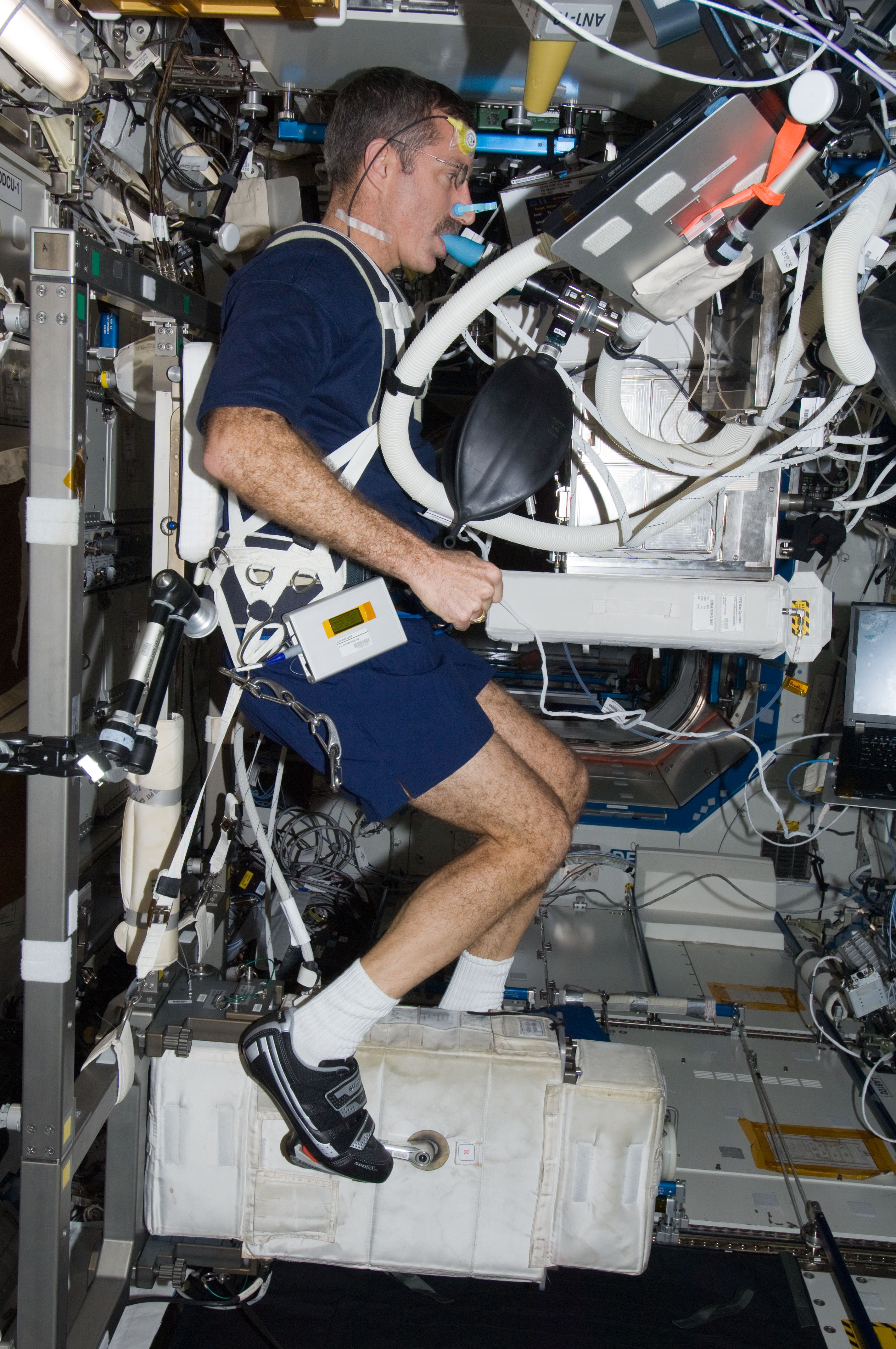 NASA Space Technology Burbank conducts a pulmonary function study while exercising on the bicycle