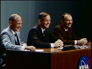 Afternoon of Aug. 12, Buzz, left, Neil, and Mike meet the press in MSC’s auditorium