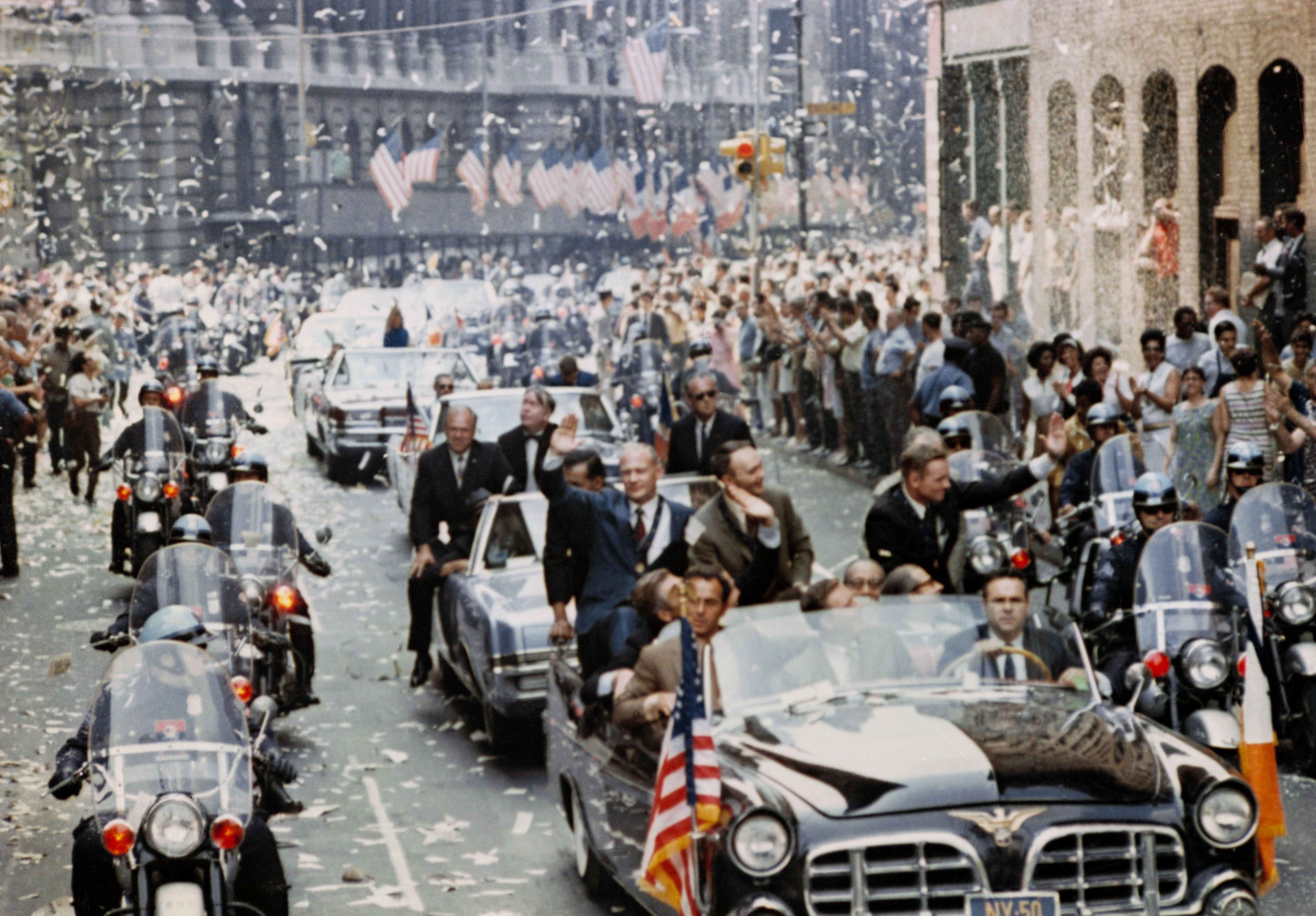 An estimated four million people attend the ticker tape parade in New York City for the Apollo 11 astronauts