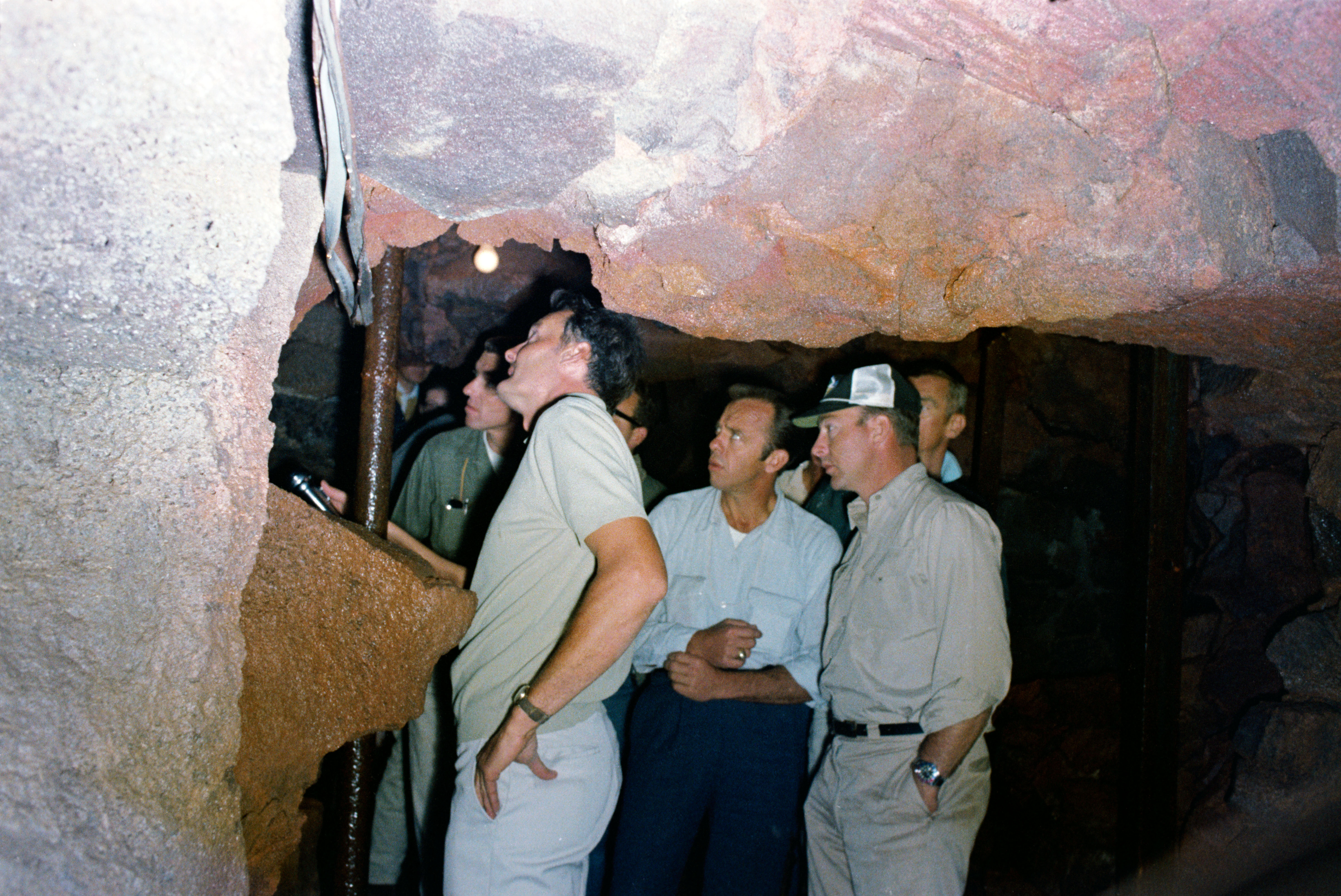 Apollo 14 astronauts Alan B. Shepard, center, and Edgar D. Mitchell, in baseball cap, during the Idaho geology field trip