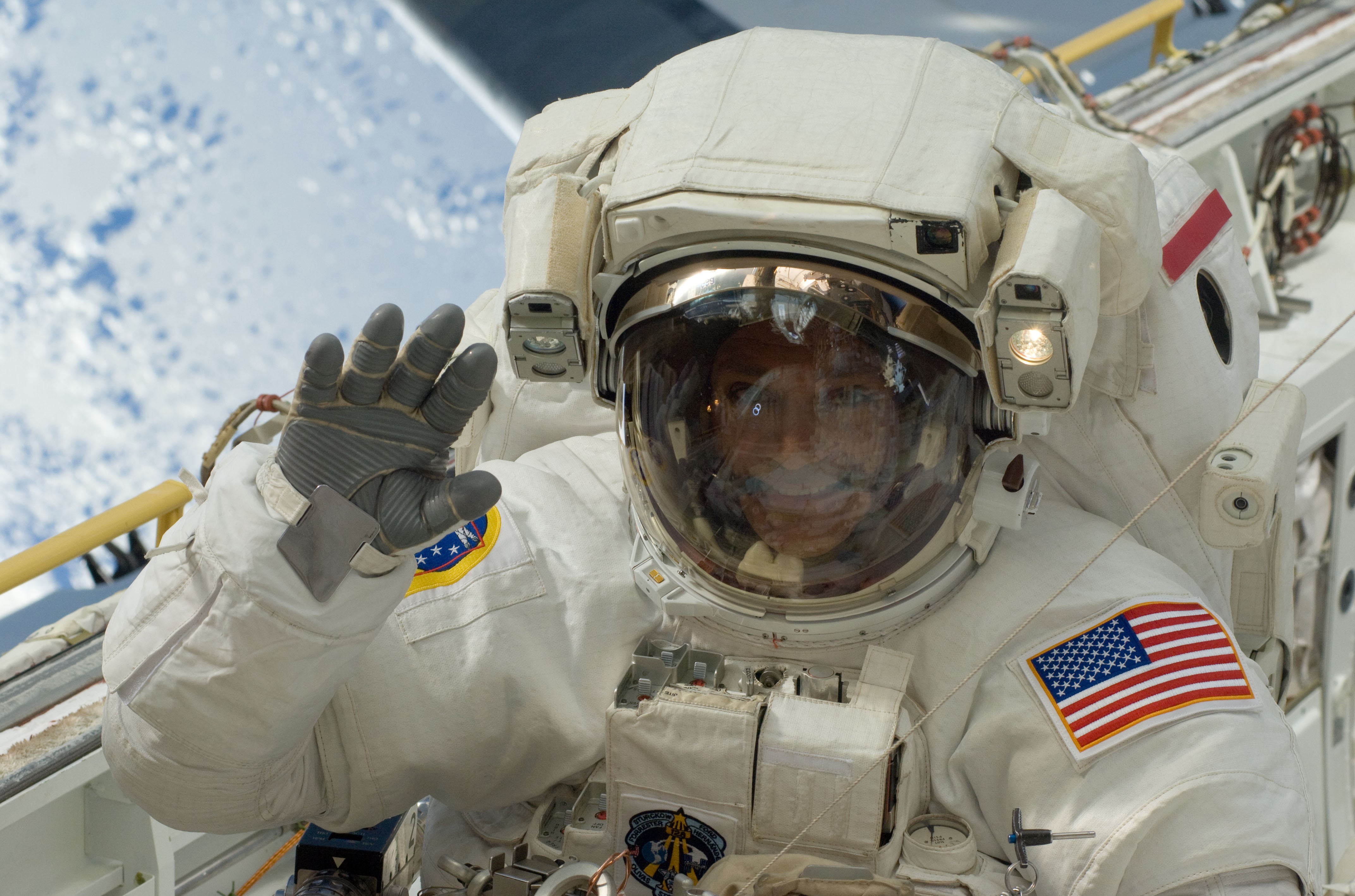 John D. “Danny” Olivas works in the shuttle’s payload bay during the mission’s third spacewalk