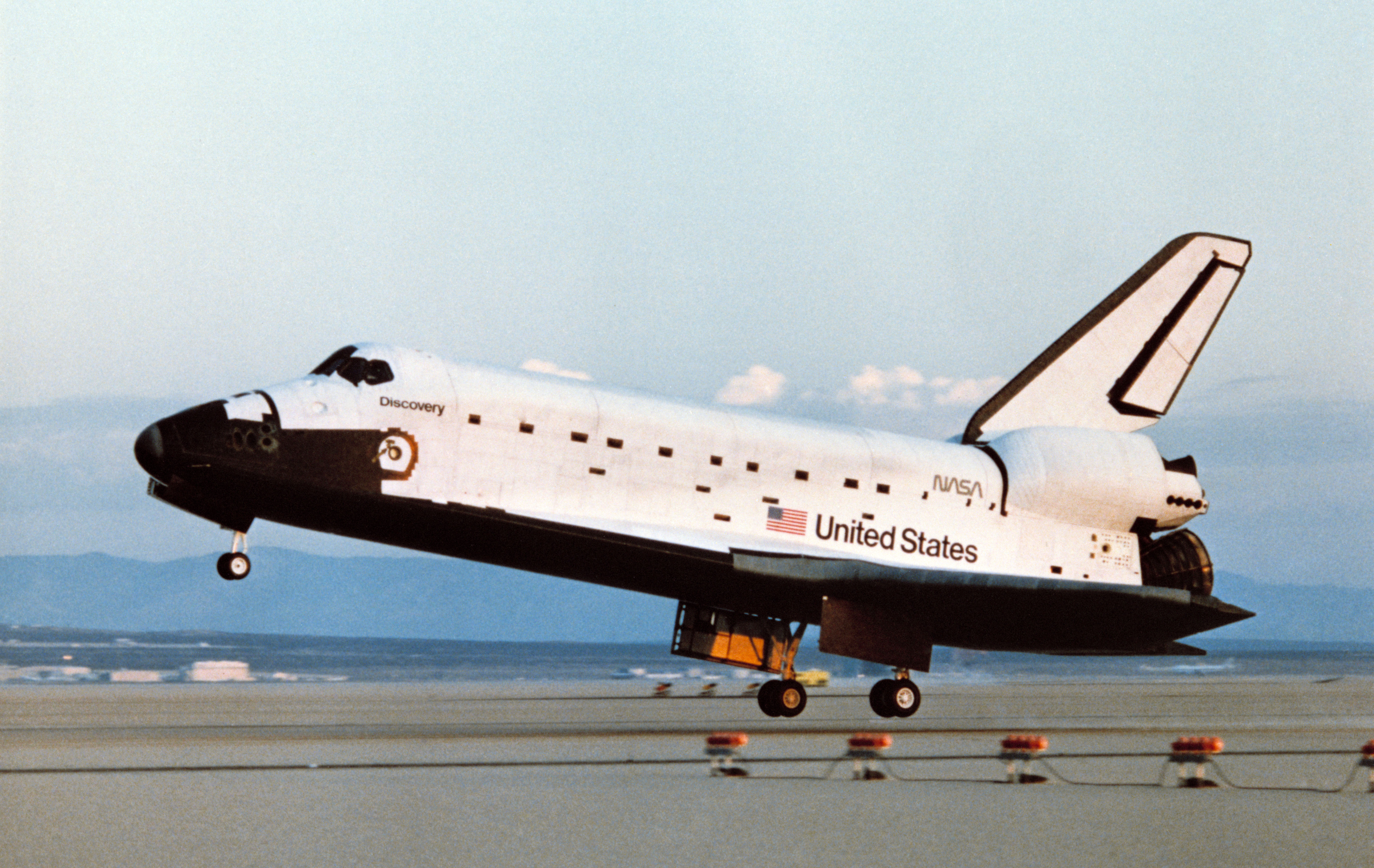 Space shuttle Discovery makes a perfect landing at Edwards Air Force Base in California to end the STS-41D mission