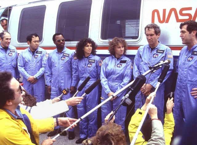 The STS-51L crew answer reporters' questions following the Terminal Countdown Demonstration Test (TCDT)