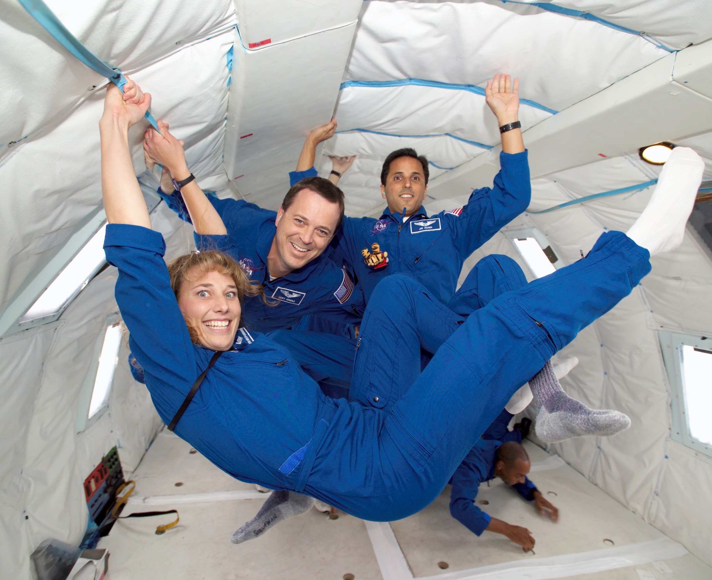 Astronauts Dorothy “Dottie” M. Metcalf-Lindenburger, left, Richard “Ricky” R. Arnold, and Joseph “Joe” M. Acaba