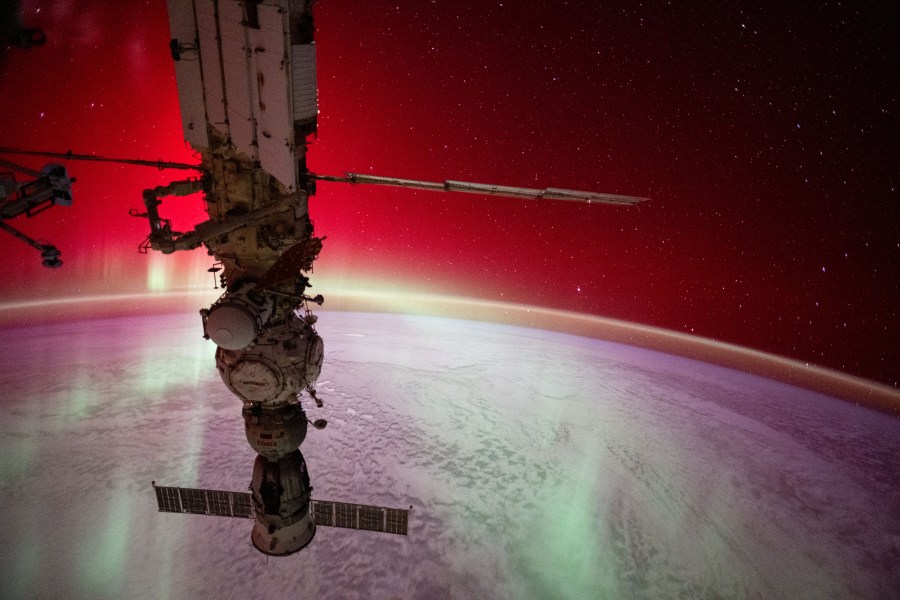 An aurora radiates brightly above the Indian Ocean in this photograph from the International Space Station as it soared 270 miles above the Earth's surface and about 1,280 miles southwest of Perth, Australia. In the foreground, is the Soyuz MS-25 crew ship docked to the Prichal docking module which is itself attached to the Nauka science module.