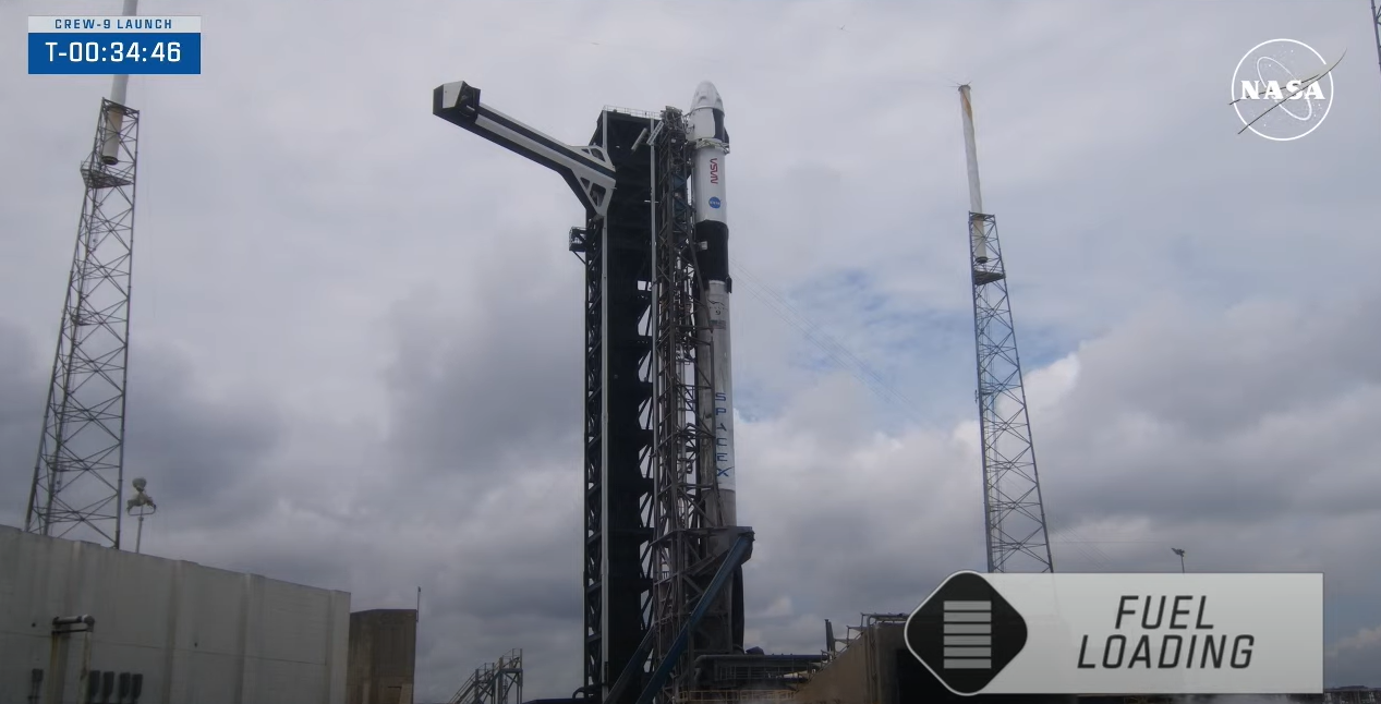 The SpaceX launch director polled NASA and SpaceX managers in Hangar X at the agency’s Kennedy Space Center in Florida and gave a 'go’ for fueling for the Falcon 9 rocket and Dragon spacecraft that will carry NASA astronaut Nick Hague and Roscosmos cosmonaut Aleksandr Gorbunov for a science expedition mission aboard the International Space 