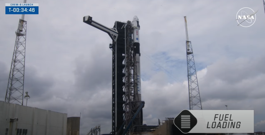 The SpaceX launch director polled NASA and SpaceX managers in Hangar X at the agencyâs Kennedy Space Center in Florida and gave a 'goâ for fueling for the Falcon 9 rocket and Dragon spacecraft that will carry NASA astronaut Nick Hague and Roscosmos cosmonaut Aleksandr Gorbunov for a science expedition mission aboard the International Space