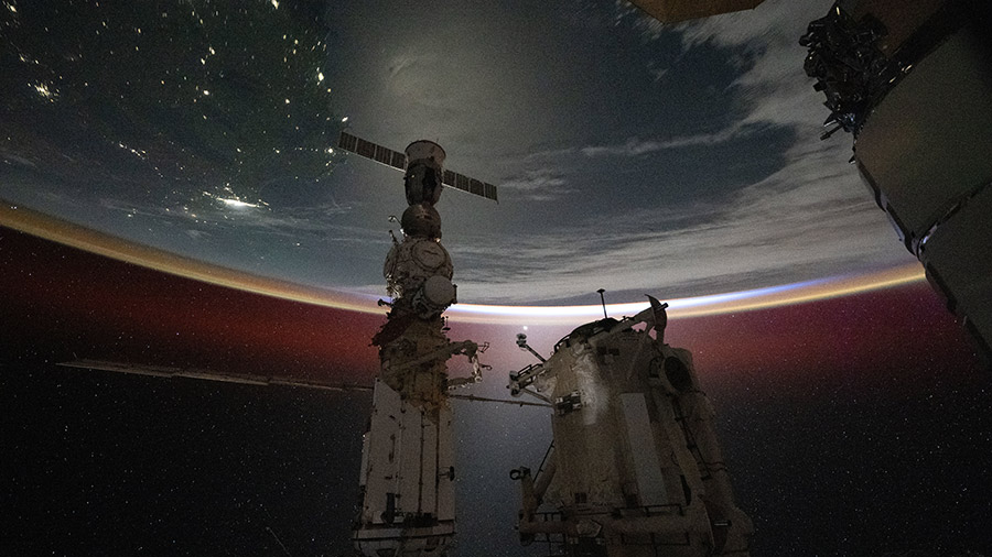 The last rays of an orbital sunset illuminate Earth's atmosphere as the space station 267 miles above off the coast of Australia. 