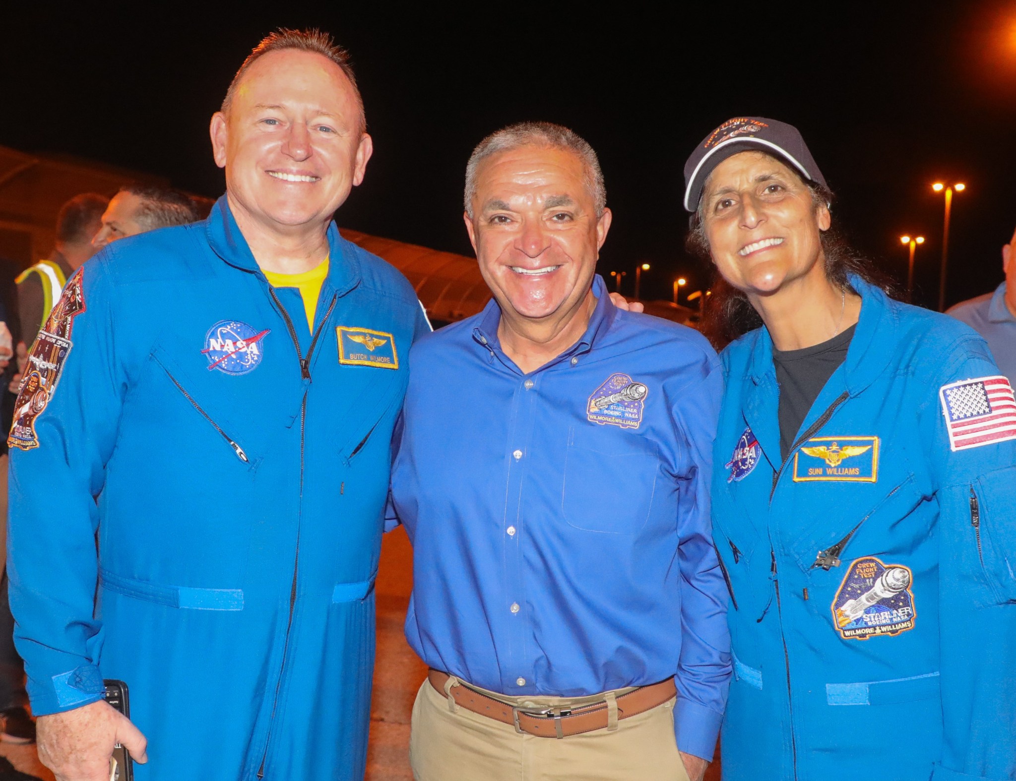 Rami Intriago is pictured standing in between NASA astronauts Butch Wilmore and Suni Williams.